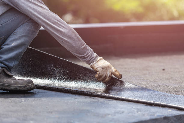 Professional Basement Waterproofing technician working in Portage, PA
